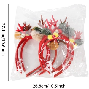 Christmas reindeer antler headband set with red berries and bells in retail packaging