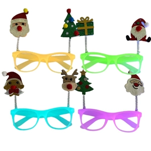 Lot de quatre lunettes de Noël colorées avec motifs Père Noël, renne et sapin festif