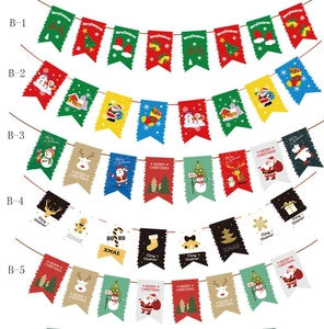 Detailed close-up showing five styles of Merry Christmas paper banners with festive patterns