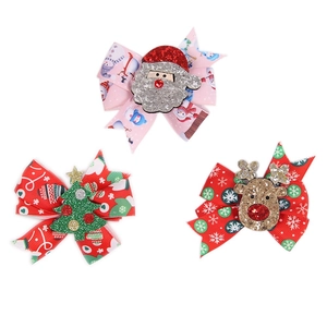 Détails de trois pinces à cheveux de Noël pailletées avec motifs Père Noël et renne