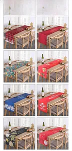 Collage of eight festive Christmas table runners with diverse holiday prints and patterns