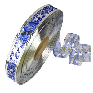 Blue sheer Christmas ribbon with silver stars and moons, 2.5cm width for gift wrapping