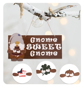 Close-up of interchangeable wooden gnome sign with seasonal holiday accessories