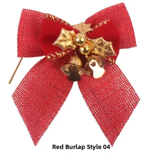 Detail view of a burlap red Christmas bow with golden bells and holly leaves decorations