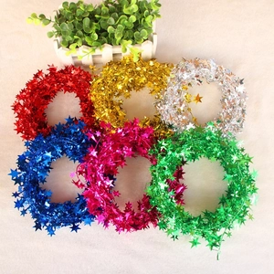 Colorful star-shaped tinsel garlands in six vibrant metallic colors for festive party decor