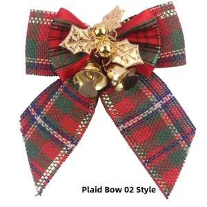 Detailed view of linen plaid Christmas bow with golden bells and holly leaf accents