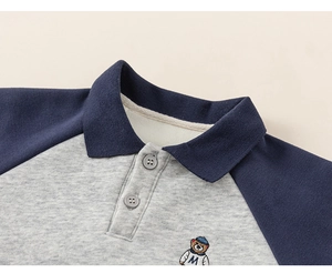 Detailed view of the Polo collar with bear embroidery on gray and navy girls' sweatshirt