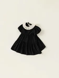 Elegant black puff sleeve girls dress with white layered collar and tiered cake skirt
