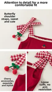 Detail of red knit camisole with plaid bow straps, lace trim, and crochet cherry accents