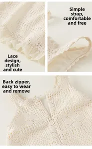 Detail of crochet hollow patterns, lace ruffle hem, and thin straps on a beige dress
