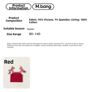 Detail of red summer girl top showing viscose fabric composition and cherry decor