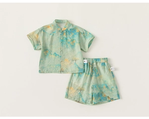 Detail of kids Chinese style set with landscape print, mandarin collar, and frog buttons