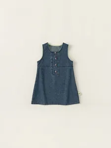 Classic dark blue denim A-line pinafore dress for girls with brown buttons and contrast piping