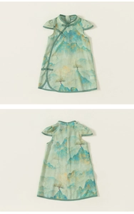 Close-up of traditional Chinese landscape print and handmade knot button on green kids qipao
