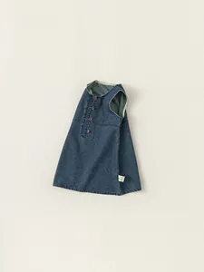 Classic dark blue denim sleeveless dress for girls featuring brown buttons and green piping