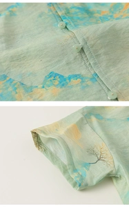 Detailed macro view of green linen fabric with mountain print and matching buttons