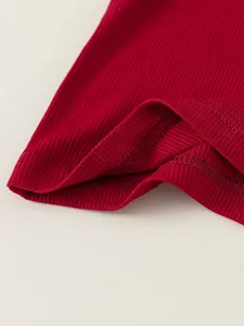 Red knit sleeveless tank top for girls featuring ribbed texture and durable stitching