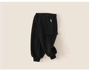 Detail view of boys cargo sweatpants featuring elastic waist and side flap pocket