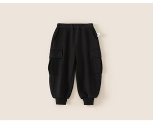 Detailed macro view of black kids cargo joggers with elastic waist and side pockets