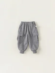 Kids light grey jogger pants with elastic waist and side cargo pockets in soft cotton