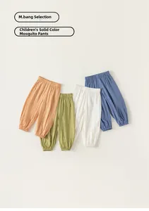 Flat lay of breathable summer mosquito pants for kids in four solid vibrant colors