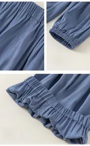 Detail view of blue mosquito pants featuring elastic cuffs, neat stitching, and soft fabric