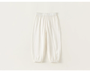 Close-up of lightweight white mosquito-repellent pants with elastic waist and ankle cuffs