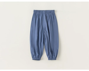 Close-up of blue breathable cotton mosquito pants with elastic waist and ribbed cuffs