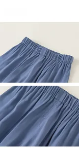 Detail view of the elastic waistband on blue lightweight mosquito pants for kids