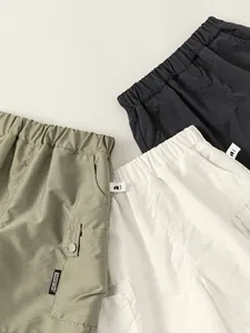 Cargo short voor jongens in groen, wit en grijs met elastische taille en sneldrogend