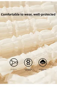 Close-up of cream layered ruffle fabric showing soft texture and skin-friendly detail