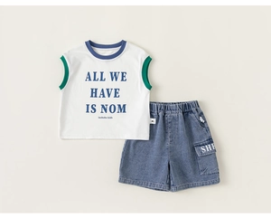 Detail of boys' summer set with letter print tank top and denim shorts on white background