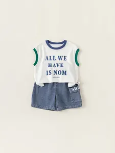 Boys summer set featuring a white sleeveless alphabet vest and classic blue denim shorts