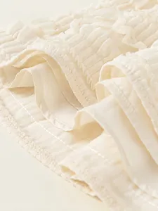 Girls sweet multi-layer tiered cake skirt in cream white with ruffled pleats detail