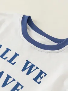 White cotton t-shirt for boys with blue rib crewneck and All We Have letter print