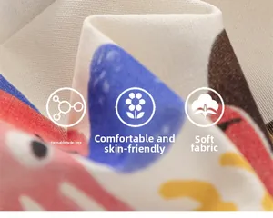 Close-up of soft cotton fabric with colorful graffiti and skin-friendly texture