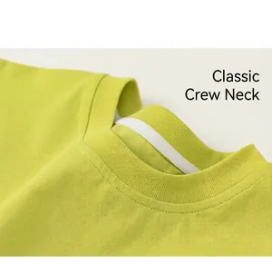 Close-up of ribbed crew neck on lime green kids t-shirt with neat stitching detail