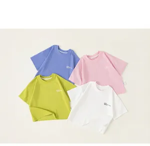 Flat lay of four cooling cotton short-sleeved t-shirts in blue, pink, green, and white colors