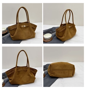 Detailed four-way views of the large brown suede tote bag with gold buckle hardware