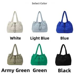 Detailed grid view showing six colors of quilted down tote bags with drawstring closure