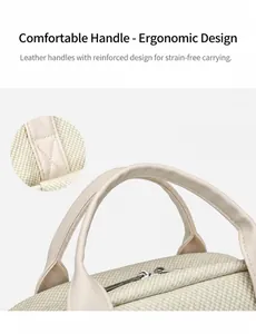Detail of cream business backpack with reinforced leather handles and precision stitching
