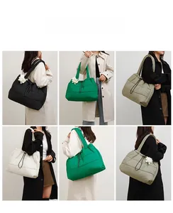 Quilted puffer tote bag in four colors with drawstring closure and teddy bear charm details
