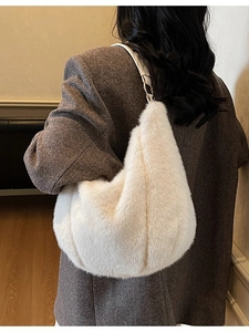 Chic white faux fur shoulder bag with soft plush texture for women in 2025 fashion