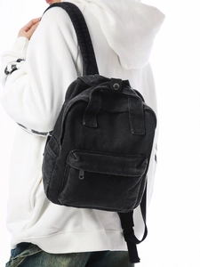 Klassischer schwarzer Denim-Rucksack für Damen im Vintage-Stil mit Reißverschlusstasche