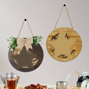 Round wooden Ramadan moon wall hangings with green plants and warm LED lighting