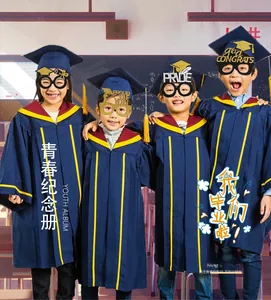 Detail of navy blue graduation gown with red piping and festive pride party glasses