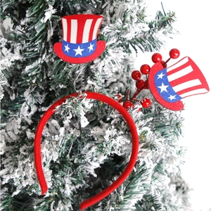 Close-up of patriotic American flag mini top hats with glitter on a red festive headband