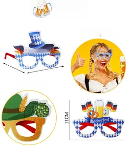 Detailed view of Oktoberfest paper glasses with beer mug and Bavarian flag patterns