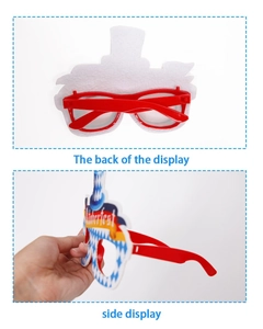 Close-up of the red foldable frame and blue Oktoberfest decorative panel on glasses