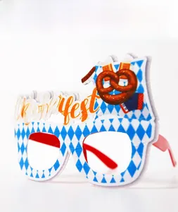 Close-up of Oktoberfest party glasses with beer, pretzel, and accordion designs